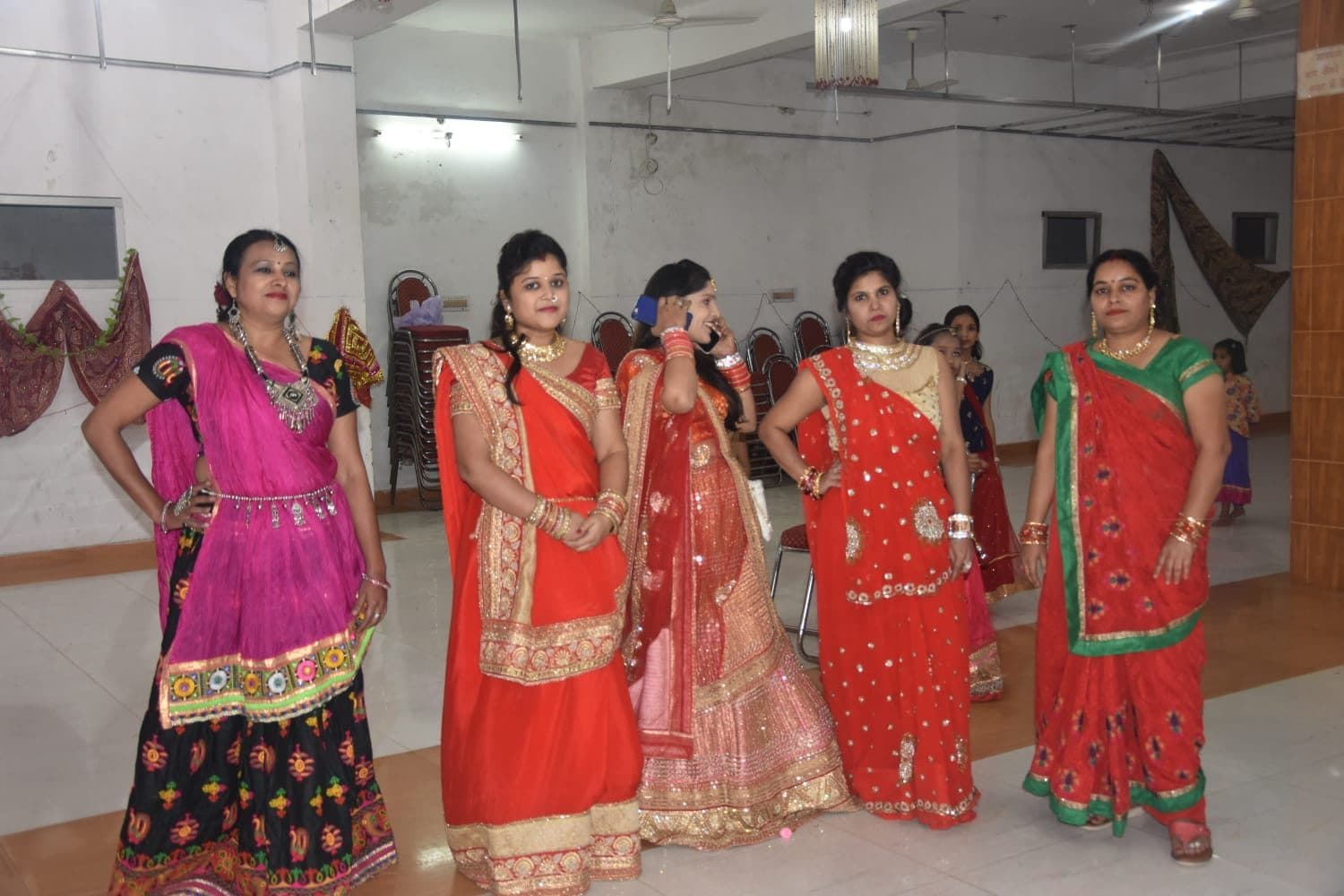 Performers in traditional outfits during a sangeet choreography session
